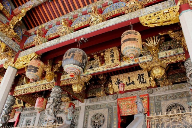 Burnished gold exterior of the Khoo Kong Si Temple Complex, presenting an otherworldly vision to the awed visitor.
