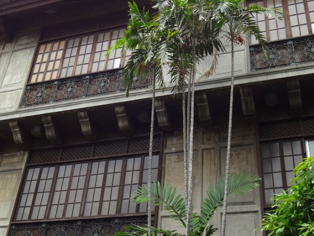 Elaborate ornamentation on the façade of a townhouse.