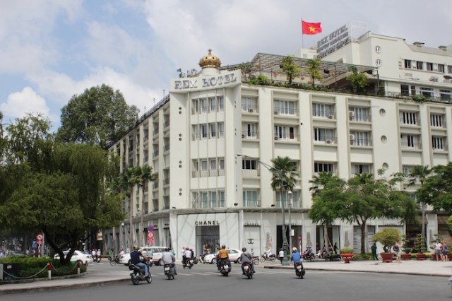 The famous Rex Hotel (1966), with its roof-top bar. Not quite on Rue Catinat, but visible from it.  It was made famous by American G.I.s during the War as its conference room held a daily conference on the state of events.  While the façade remains, the interior is now plush, luxurious and contemporary. 