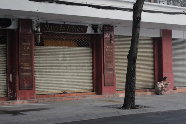 There has been store run by the Nguyen Brothers on this site since the ‘50s.  It was previously a cotton and silk store called Nguyen Chi Hoa.  Now its an antiques and novelties store.