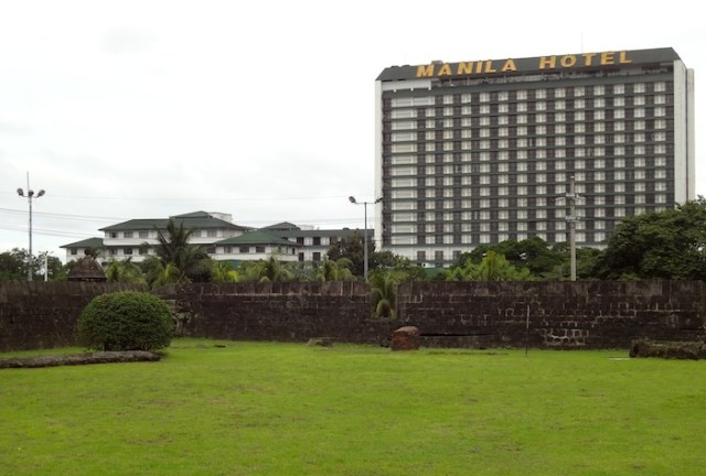 View of the Manila Hotel from within Intramuros, showing the original 5-storey building built in 1912, as well as the 18-storey tower block, built in the mid ‘70s.
