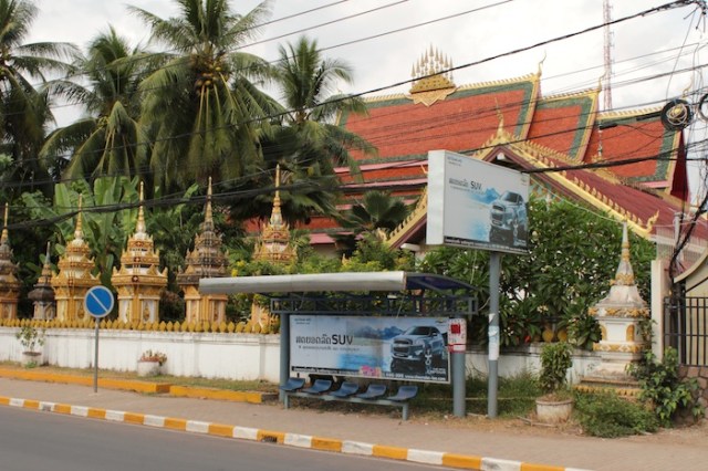 Juxtaposition of old and new, in a scene channeling Bangkok, Thanon Fa Ngum