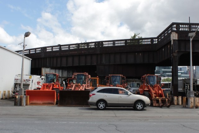 3 – Department of Sanitation vehicles parked underneath the High Line.