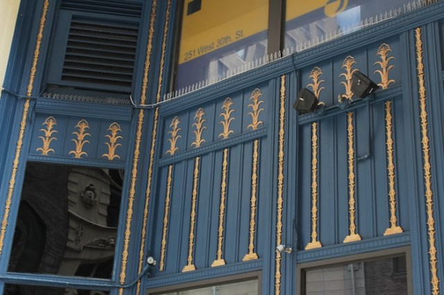 14 – No. 251: A sacred grove of old papyri set against a sea-blue background.