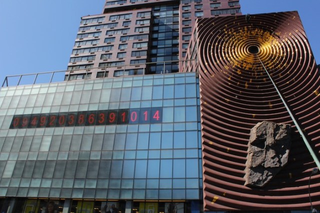 26 – Metronome, by Kristin Jones and Andrew Ginzel, the large public art installation on the façade of One Union Square South.  The digits to the left show the time using a 24 hour clock (if read from the left), and a reverse 24-hr clock, i.e. time remaining in the day, when read from the right.  