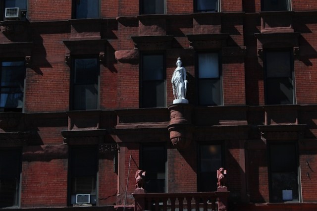 36 – A statue of Joan of Arc, presiding over a building named after her - the Jeanne d’Arc apartments (1888).