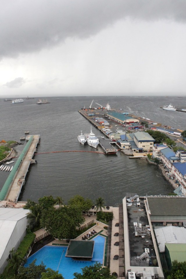 View from my window of Manila Bay, the Cruise Terminal, the Manila Hotel pool, and a huge storm brewing.