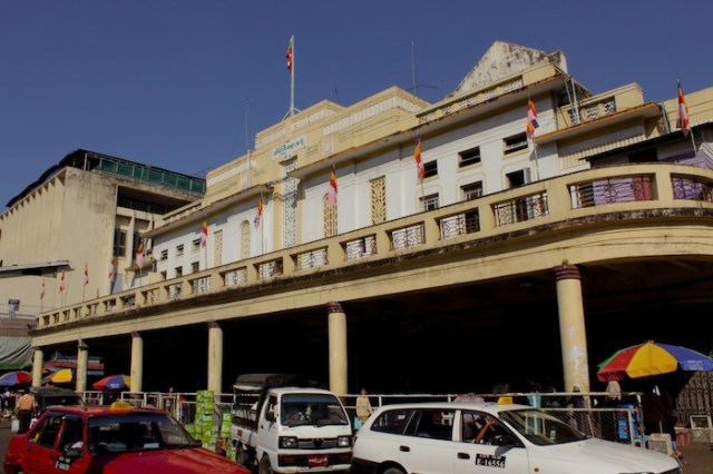 Thein Gyi Market, occupying an entire block.  This façade sits along Mahabandoola Road and 25th Street.