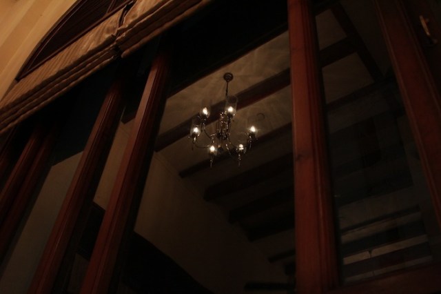 Reflection of a chandelier at the Strand Café. 