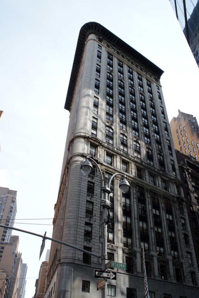 13 – Scene switches to now, where he has lost everything, and he looks up at the skyline that was once all his.