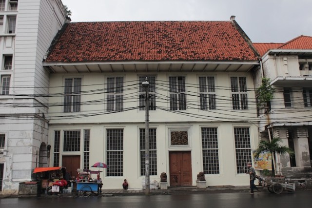 Two houses down sits another building of a similar design.   