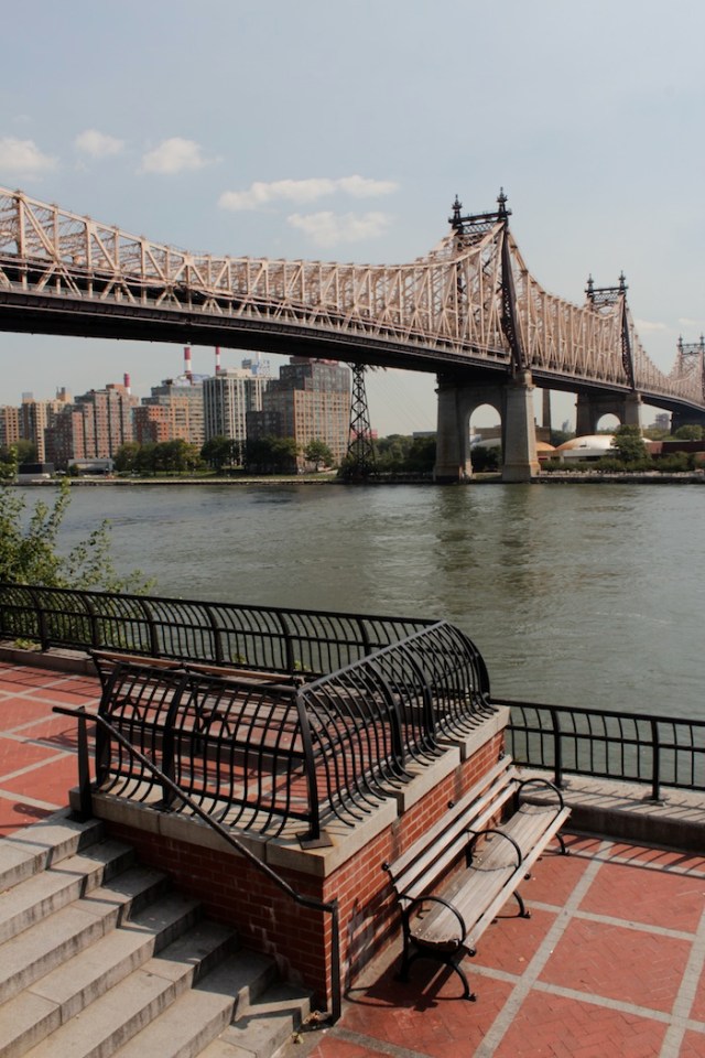 45 – At the edge of the water, they both sit and contemplate the view of Queensboro Bridge.  It is silent.  They have found peace and shelter, or so they think.  