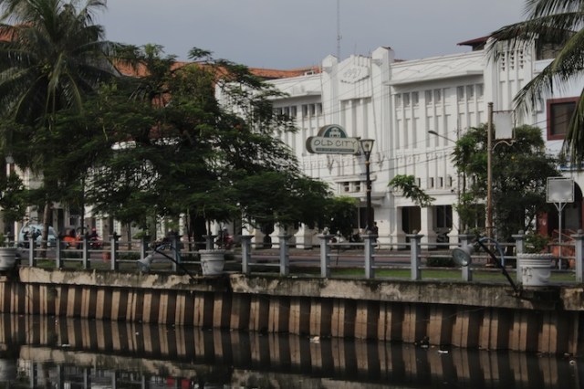 View across the water to the Old City Entertainment Centre, housed in an Art Deco building built in 1929.