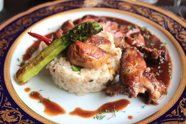 The restaurant's specialty - a grilled pigeon on a ridiculously flavorful bed of risotto.  