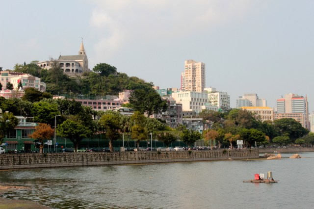 A bend in the road affords a spectacular view of Penha Hill and Penha Church (to the left) and the Bela Vista Hotel (to the right).