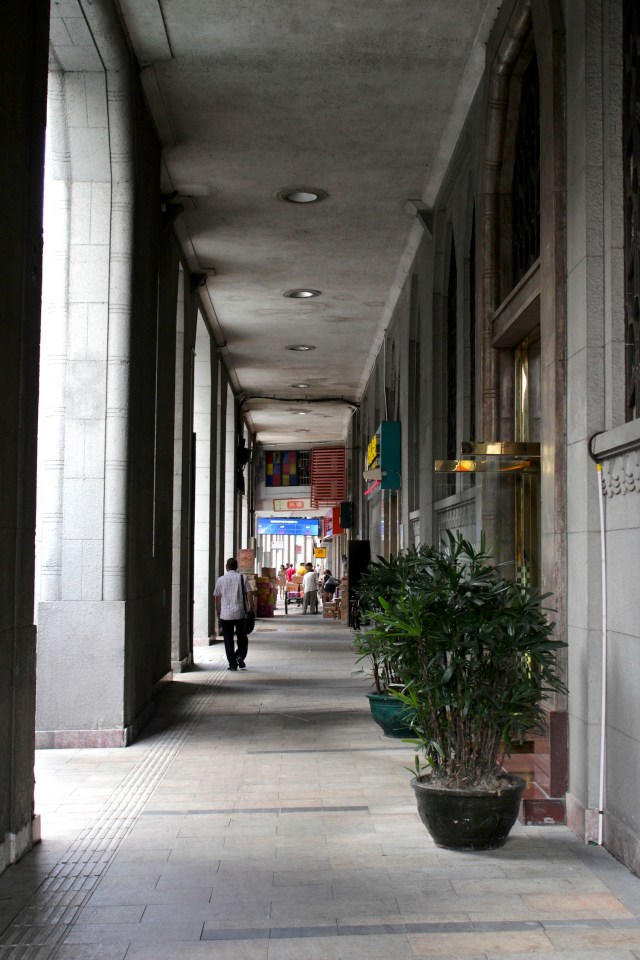 Colonnaded walkways, reminiscent of five-foot ways in Southeast Asia.