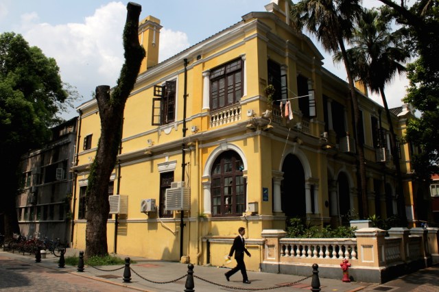 Unidentified yellow building.