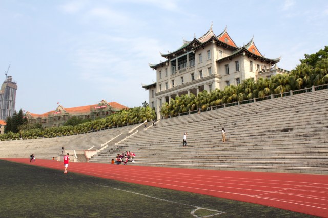 The Assembly Hall presides over the University's Olympic-size school-field and running track; which itself echoes the design of The Chinese High School's main building and schoolfield in Singapore.