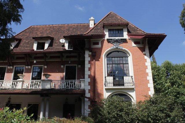 The Villa Rouge, as it was called, was the headquarters of the French Pathé Company in Shanghai. It was built in 1921. 