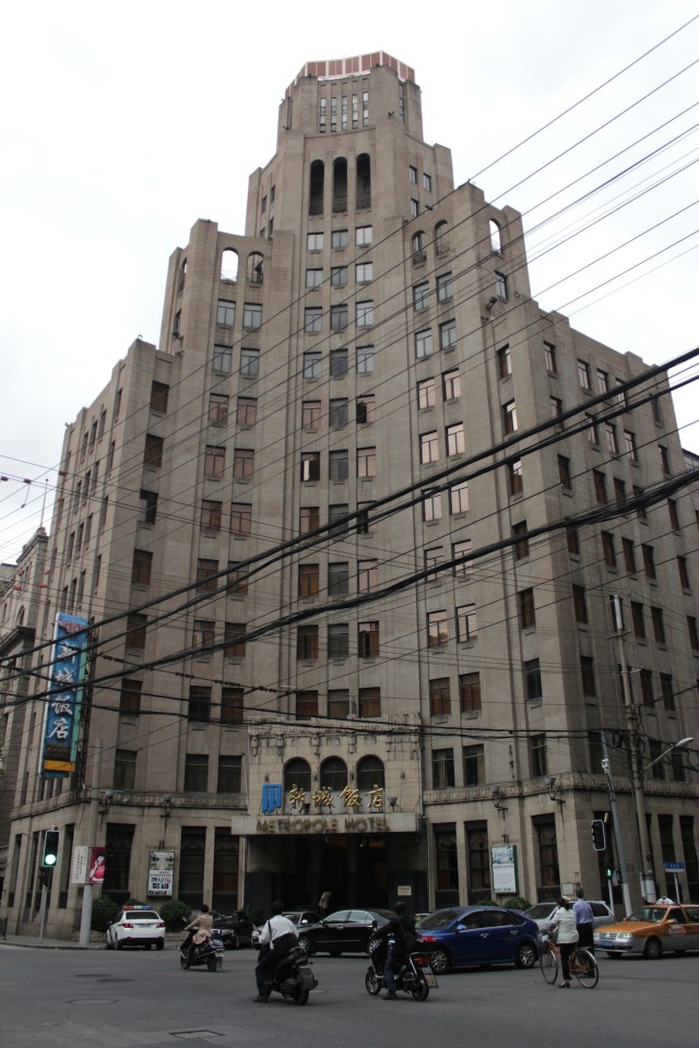 The second of the buildings is the famous Metropole Hotel, designed by Palmer & Turner and opened in 1934.