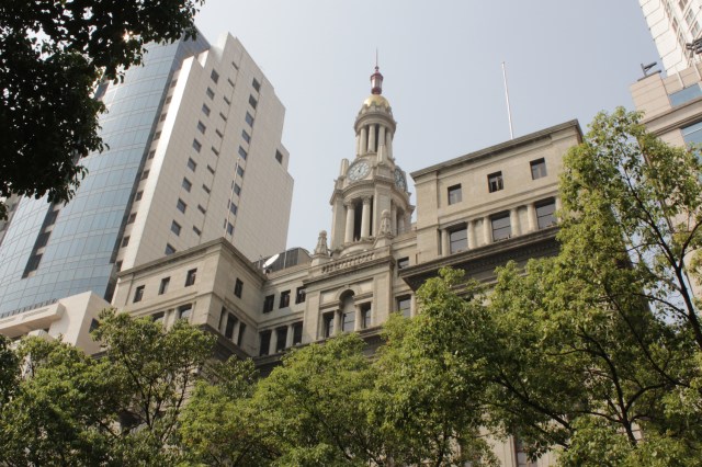 The China United Assurance Apartments was a luxury apartment complex built in 1926, that was then transformed into the Pacific Hotel in 1940.  It was also designed by Elliott Hazzard.