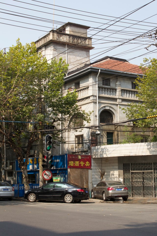 German villa behind contemporary facade.