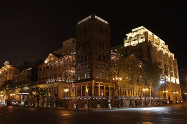 The Astor Hotel at night.  