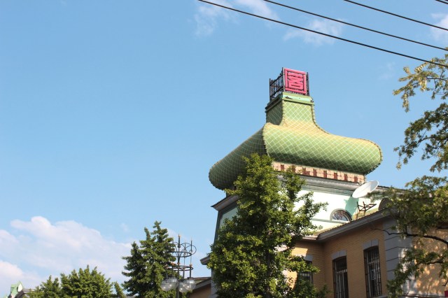 This very distinctive roof suggests this could be an authentic, restored building. 