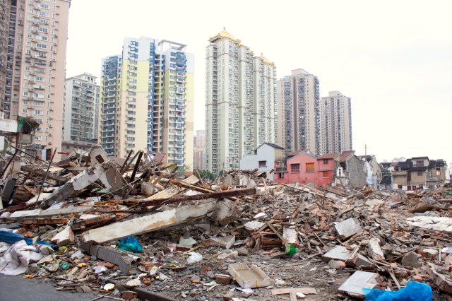 Whole tracts of old residences already destroyed, and the high-rises being built in their place.  