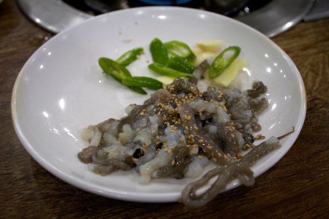 Sannakji, or live baby octopus.  Not for the faint-hearted.  