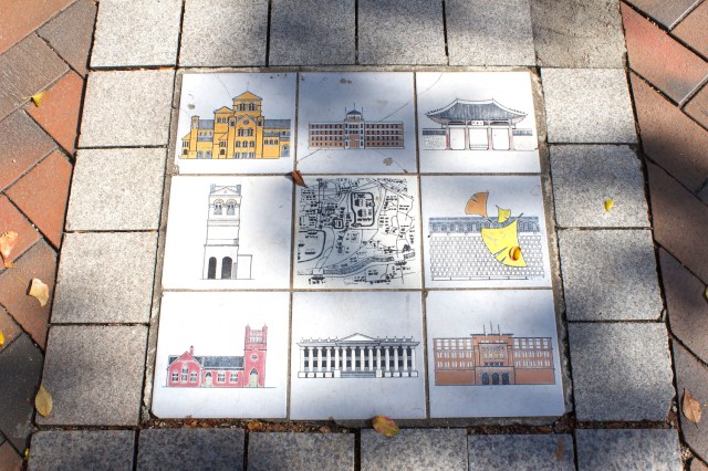Specialty tiles laid into the pavement showing the key sights in Jeong-dong. 