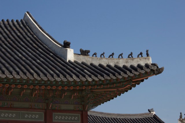 Close-up of traditional roofs, betraying influence of Ming dynasty palace architecture like in the Forbidden City in Beiijing.
