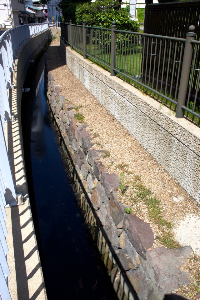 The exposed original perimeter walls of Dejima. 