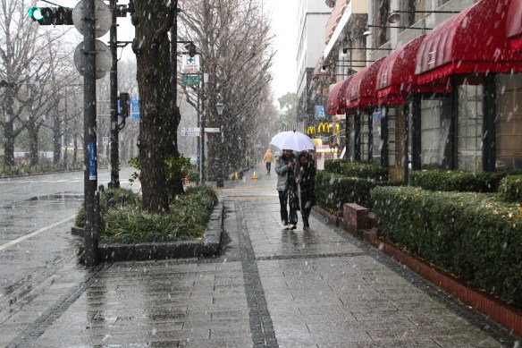 Snow on the streets by the Hotel New Grand.