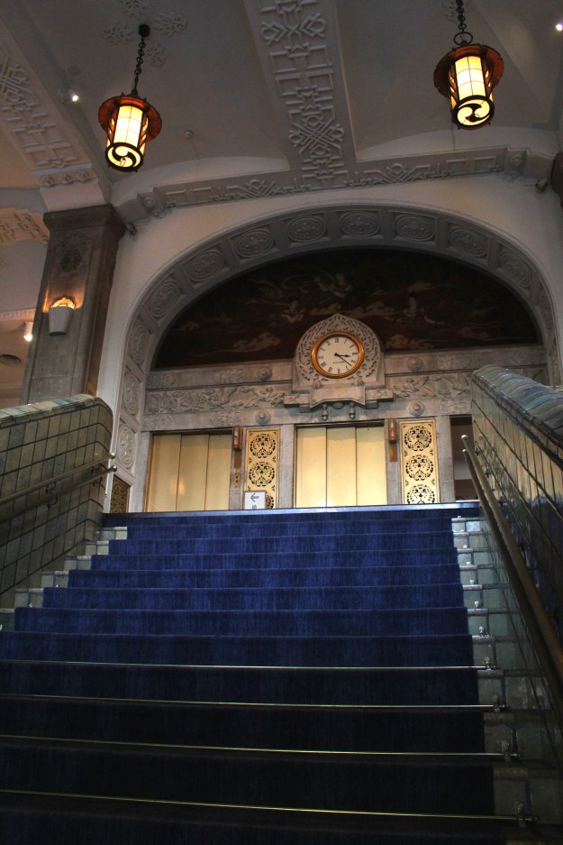 The old stairway leading dramatically up to the former lobby.  