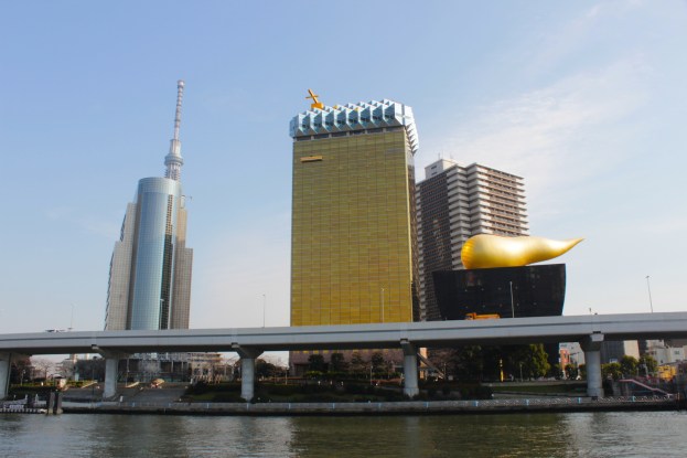 The Sumida River today, with the infamous Asahi statue.  